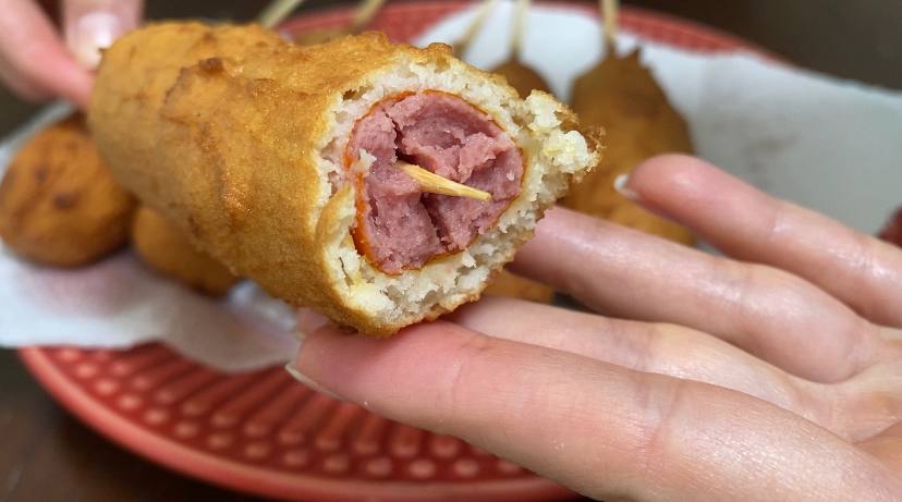 Gluten-free and lactose-free corn dog inside